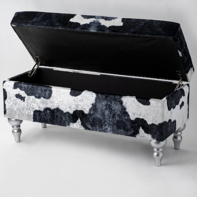 Tapicerowana pufa ze schowkiem w motyw krowi