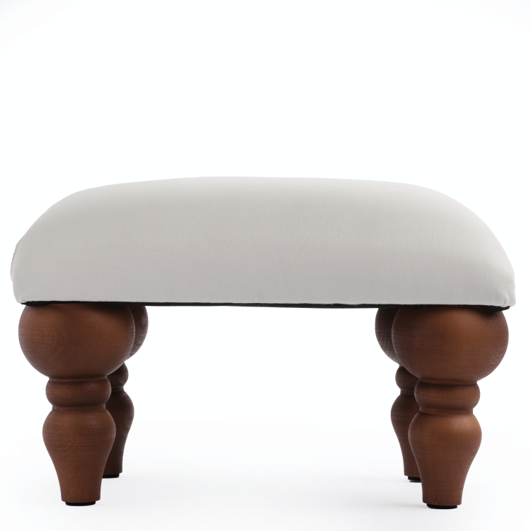 Podnóżek do fotela w białym kolorze, praktyczny i estetyczny mebel