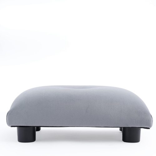 Pikowany podnóżek w kolorze szarym, wygodny i dekoracyjny mebel