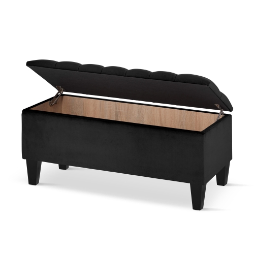 Czarna pikowana otwierana skrzynia  na czarnych nogach