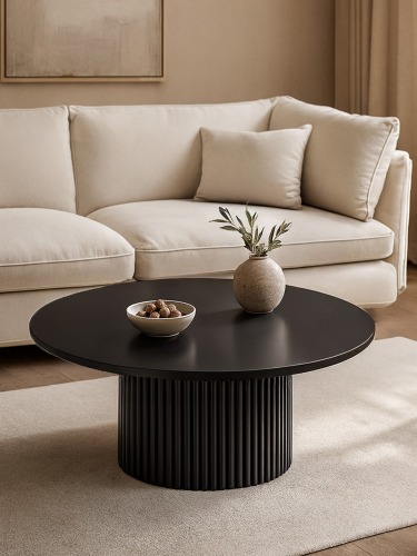 czarny stolik kawowy z ryflowaną nogą