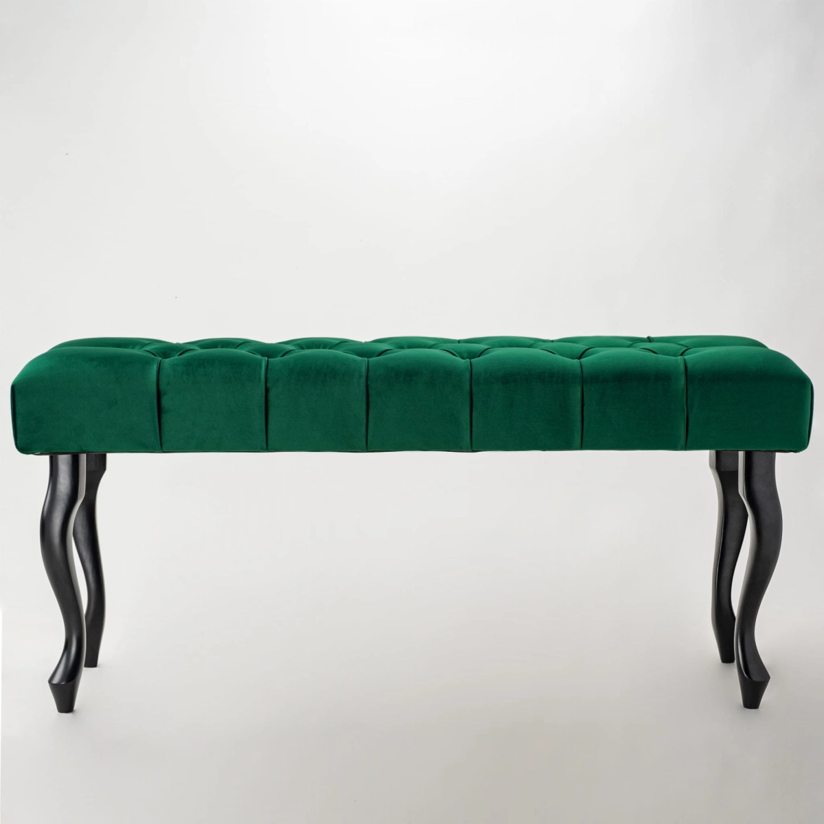 Pikowana ławka chesterfield w kolorze butelkowej zieleni