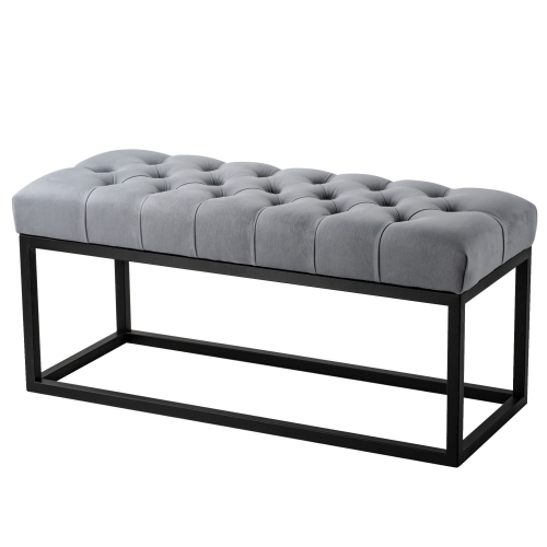 Pikowana ławka w szarym kolorze na metalowych nogach